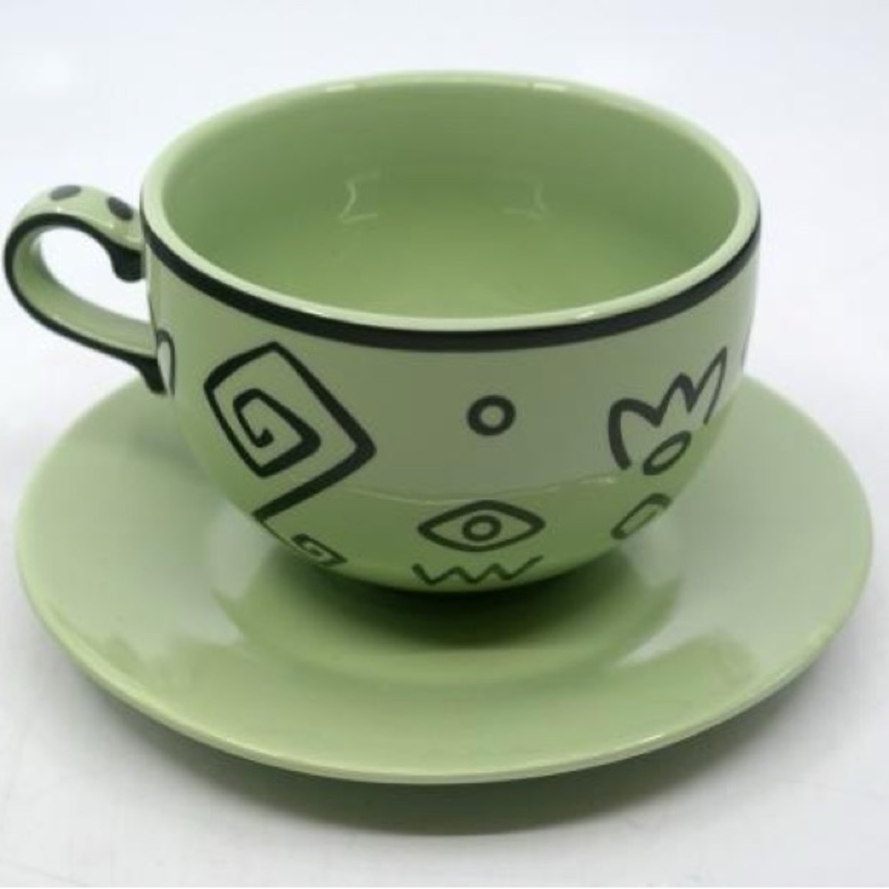 Alice in Wonderland Mad Tea Party Teacup and Saucer